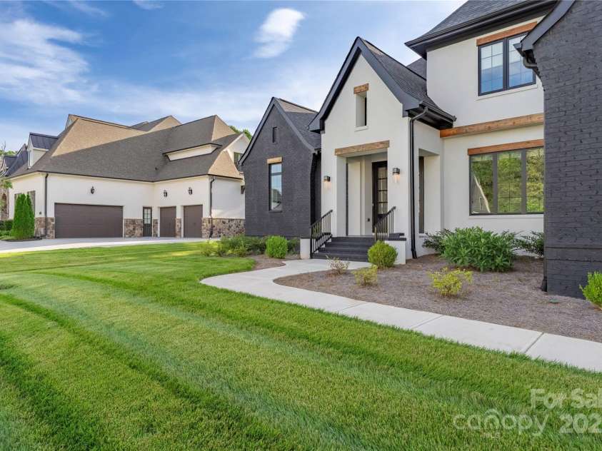 10119 Laurier Lane, Huntersville, NC 28078.  MLS# CAR4273565, YatesRealty ID 23623. Modern Black & White Front Exterior