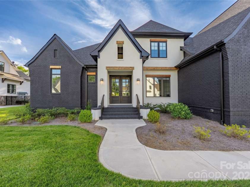 10119 Laurier Lane, Huntersville, NC 28078.  MLS# CAR4273565, YatesRealty ID 23623. Modern Black & White Front Exterior