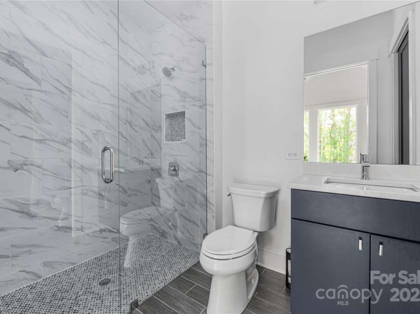10119 Laurier Lane, Huntersville, NC 28078.  MLS# CAR4273565, YatesRealty ID 23623. Zero Entry Shower