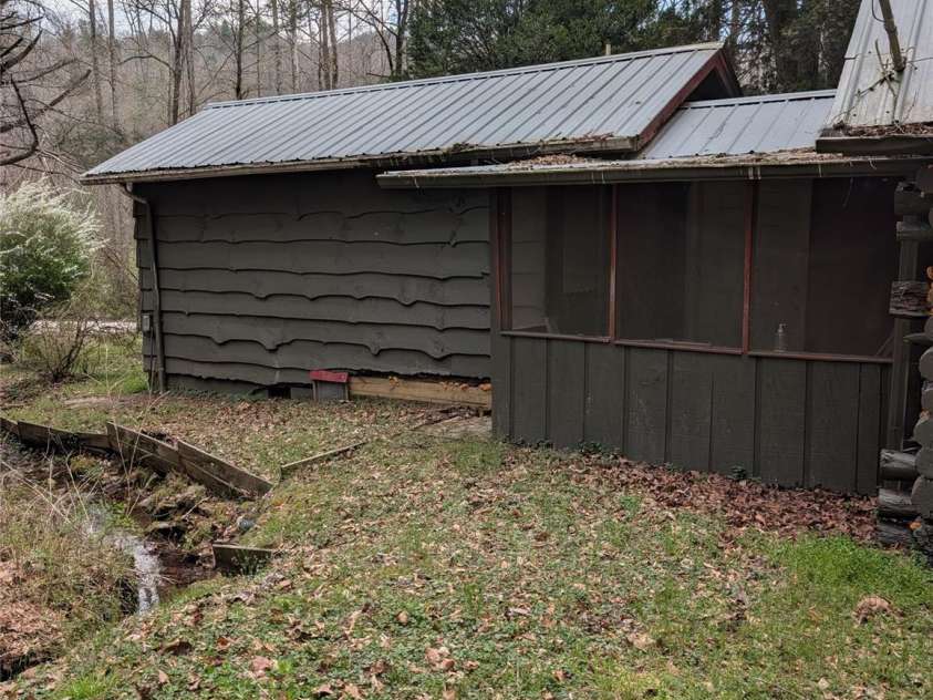 6712 Globe Road, Lenoir, NC 28645.  MLS# CAR4361290, YatesRealty ID 23624. Back porch