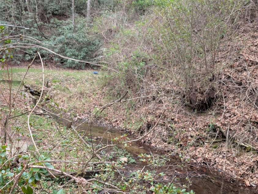 6712 Globe Road, Lenoir, NC 28645.  MLS# CAR4361290, YatesRealty ID 23624. Stream on property