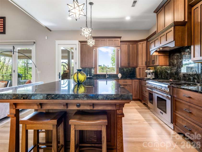 32 Timberwolf Court, Asheville, NC 28804.  MLS# CAR4376999, YatesRealty ID 23625. Chef's Kitchen with western facing views. Open concept allowing for spacious entertaining