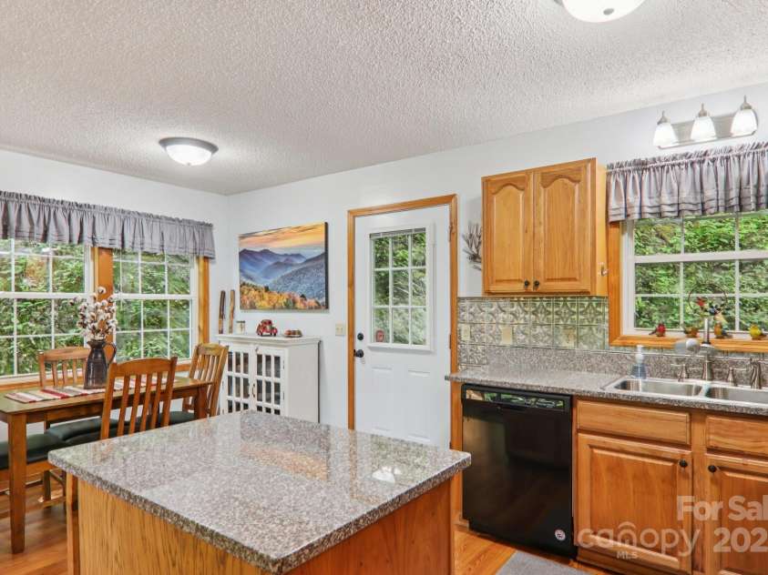 84 Hawk Nest Road, Maggie Valley, NC 28751.  MLS# CAR4271436, YatesRealty ID 23625. 
