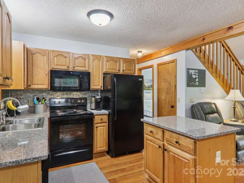 84 Hawk Nest Road, Maggie Valley, NC 28751.  MLS# CAR4271436, YatesRealty ID 23625. 