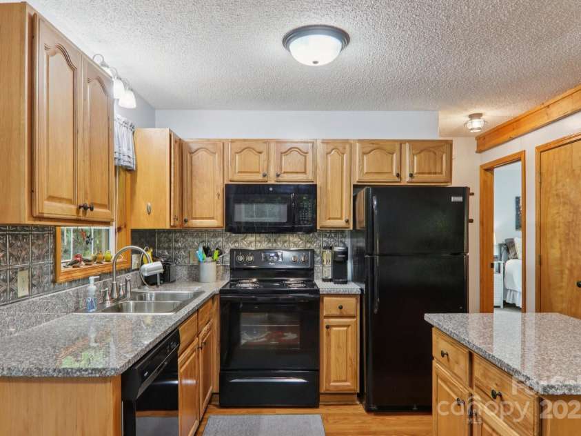 84 Hawk Nest Road, Maggie Valley, NC 28751.  MLS# CAR4271436, YatesRealty ID 23625. 