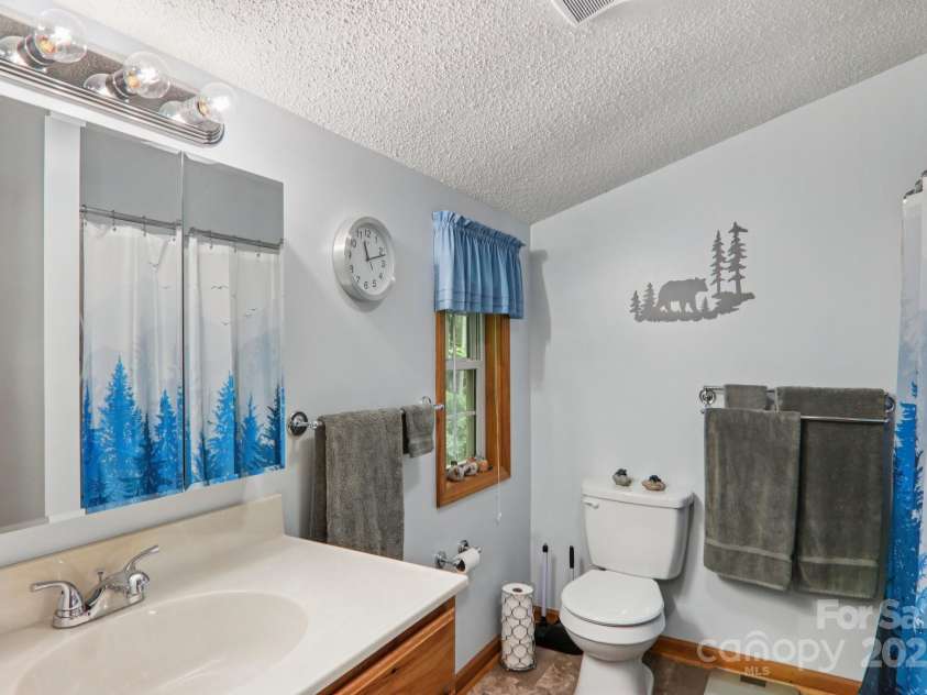 84 Hawk Nest Road, Maggie Valley, NC 28751.  MLS# CAR4271436, YatesRealty ID 23625. 