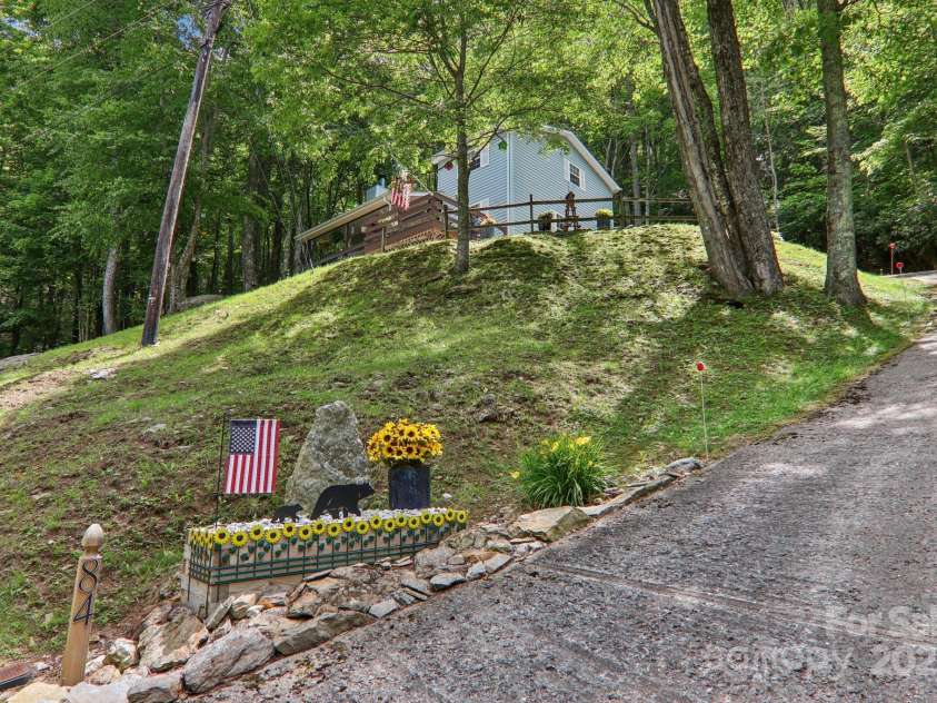 84 Hawk Nest Road, Maggie Valley, NC 28751.  MLS# CAR4271436, YatesRealty ID 23625. 