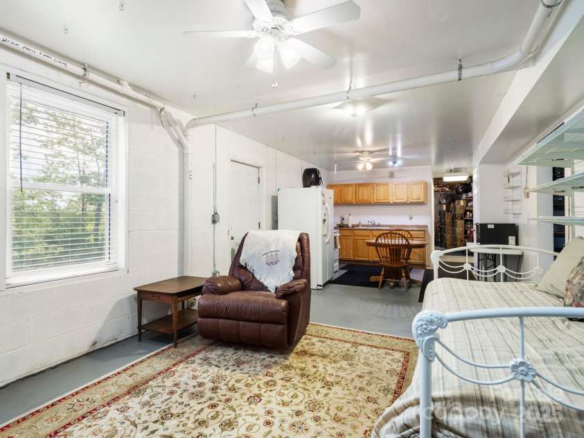 66 Condor Court, Hendersonville, NC 28792.  MLS# CAR4274638, YatesRealty ID 23627. Basement 2nd Living area