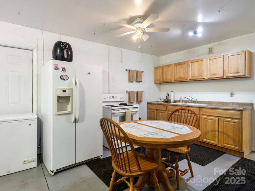 66 Condor Court, Hendersonville, NC 28792.  MLS# CAR4274638, YatesRealty ID 23627. Basement Kitchen