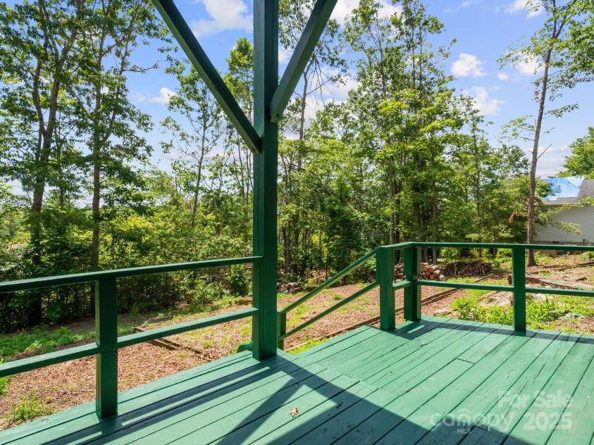 66 Condor Court, Hendersonville, NC 28792.  MLS# CAR4274638, YatesRealty ID 23627. Open Back Deck