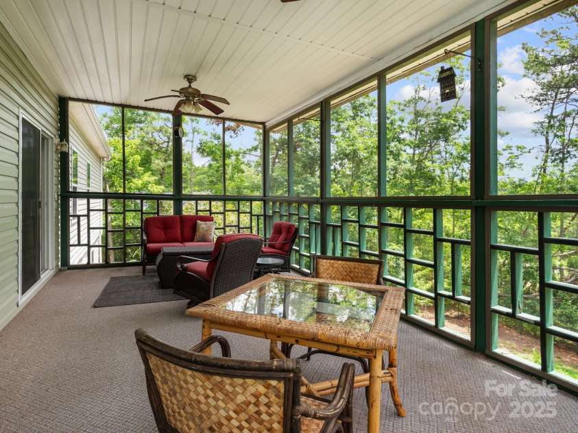 66 Condor Court, Hendersonville, NC 28792.  MLS# CAR4274638, YatesRealty ID 23627. Screened In Back Deck