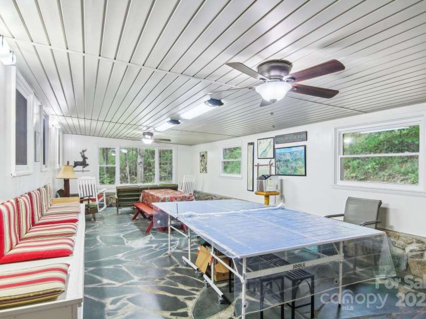 51 Atari Road, Waynesville, NC 28786.  MLS# CAR4256064, YatesRealty ID 23630. Rec room and entertaining