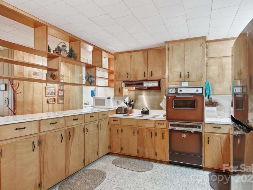 51 Atari Road, Waynesville, NC 28786.  MLS# CAR4256064, YatesRealty ID 23630. This spacious kitchen has lovingly feed several generations 