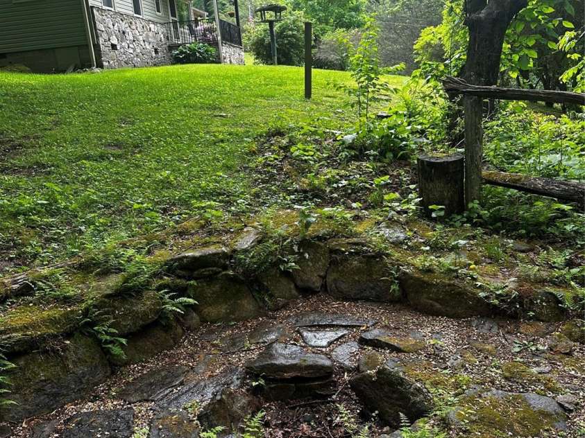 51 Atari Road, Waynesville, NC 28786.  MLS# CAR4256064, YatesRealty ID 23630. View from fire pit looking towards the house