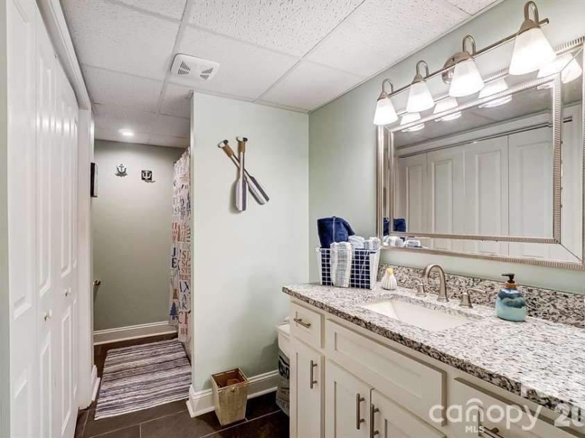 9542 Riviera Drive, Sherrills Ford, NC 28673.  MLS# CAR4362980, YatesRealty ID 23631. A 3rd full bathroom downstairs