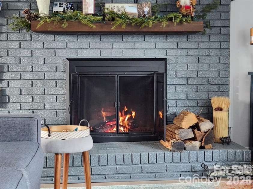 9542 Riviera Drive, Sherrills Ford, NC 28673.  MLS# CAR4362980, YatesRealty ID 23631. Real wood fireplace upstairs