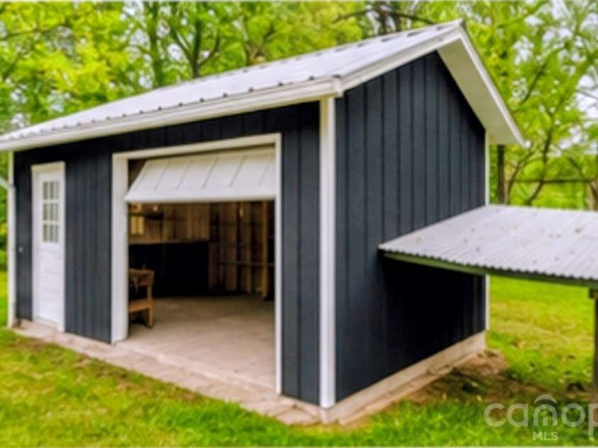 109 Wall Road, Tryon, NC 28782.  MLS# CAR4326151, YatesRealty ID 23634. AI ALTERED IMAGE OF POSSIBILITIES