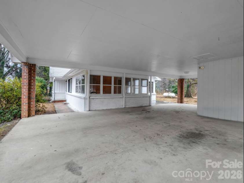 109 Wall Road, Tryon, NC 28782.  MLS# CAR4326151, YatesRealty ID 23634. Carport