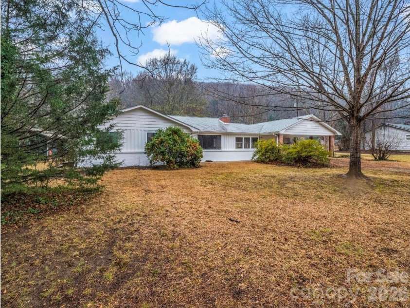 109 Wall Road, Tryon, NC 28782.  MLS# CAR4326151, YatesRealty ID 23634. Mountain views out front and the river out back! It doesn't get any better than this!