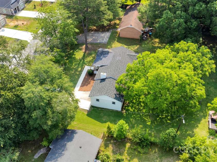 506 Maine Avenue, Bessemer City, NC 28016.  MLS# CAR4077822, YatesRealty ID 23636. Add a deck, patio, or fire pit—this backyard is ready for your creative vision and weekend fun.