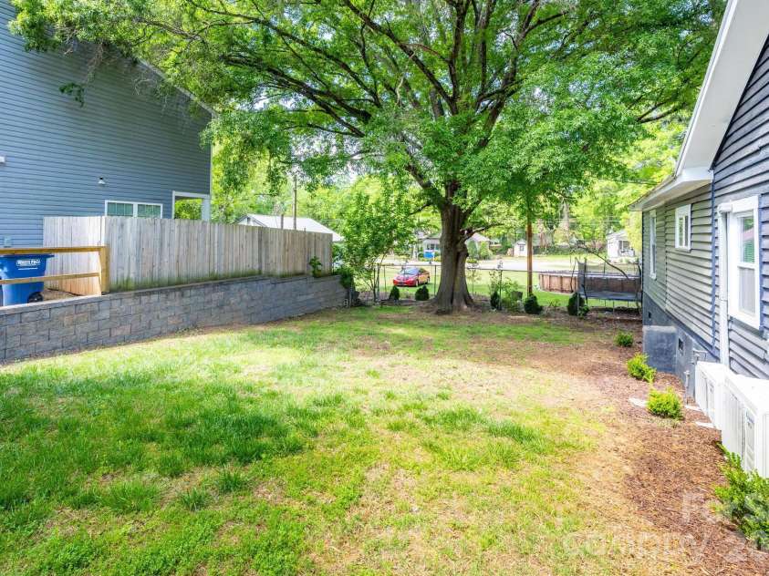 19513 Meridian Street, Cornelius, NC 28031.  MLS# CAR4370578, YatesRealty ID 23641. Side Yard