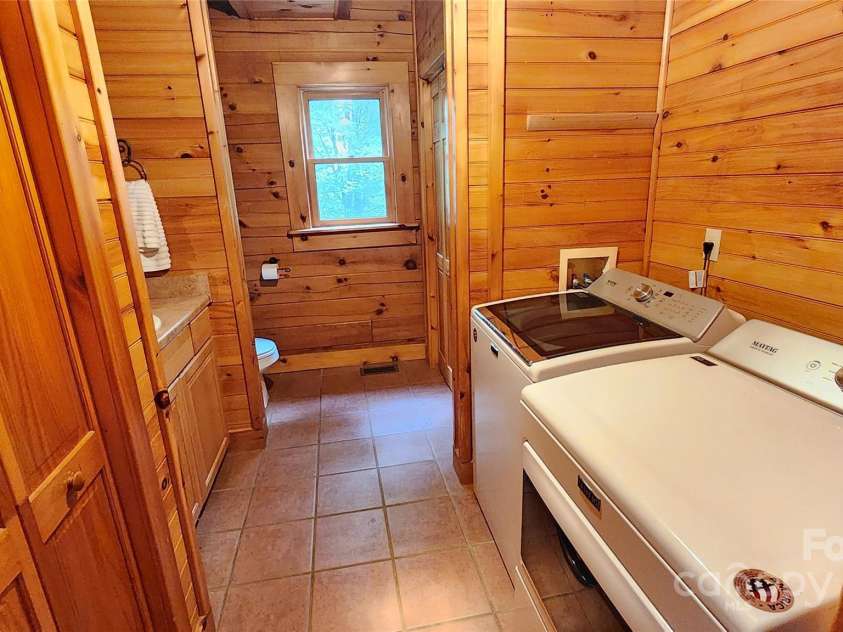 306 Henry Dingus Way, Maggie Valley, NC 28751.  MLS# CAR4183056, YatesRealty ID 23643. Half Bath and laundry room on main level