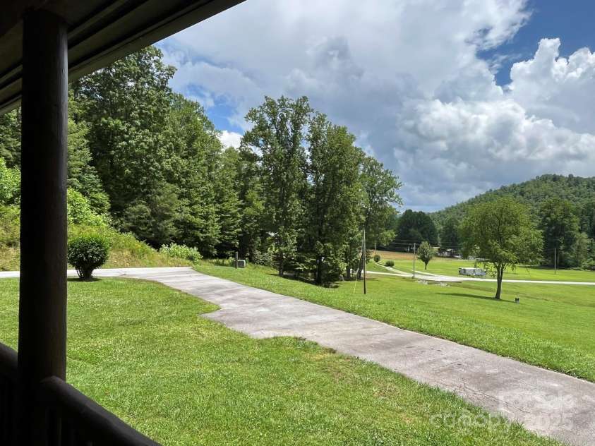 621 Cherryfield Creek, Brevard, NC 28712.  MLS# CAR4269516, YatesRealty ID 23646. Front Porch View