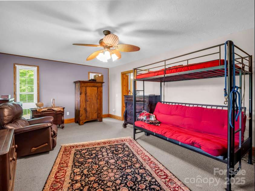 621 Cherryfield Creek, Brevard, NC 28712.  MLS# CAR4269516, YatesRealty ID 23646. Main Level Primary Bedroom