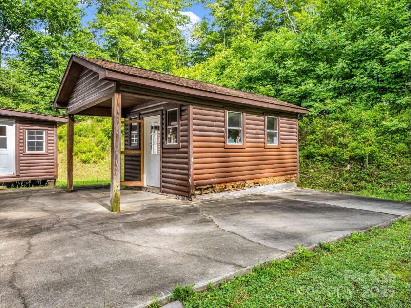 621 Cherryfield Creek, Brevard, NC 28712.  MLS# CAR4269516, YatesRealty ID 23646. Matching Shed w/Power
