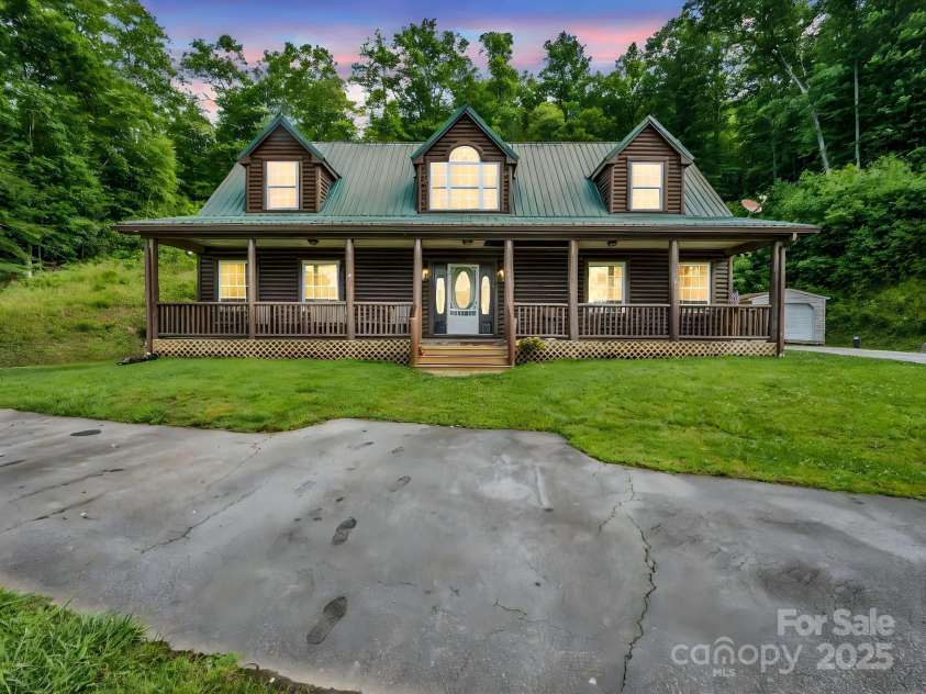 621 Cherryfield Creek, Brevard, NC 28712.  MLS# CAR4269516, YatesRealty ID 23646. Twilight Photo Staged