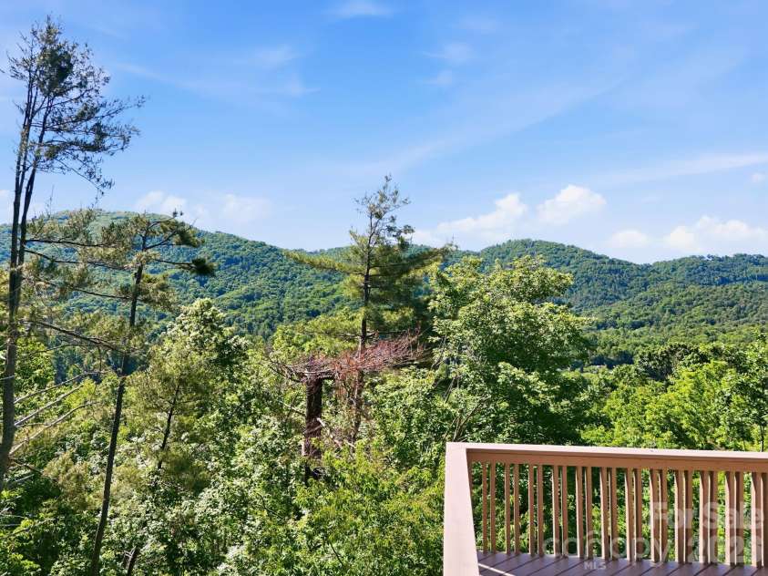 68 Stony Ridge, Asheville, NC 28804.  MLS# CAR4367321, YatesRealty ID 23646. More Views and more deck.