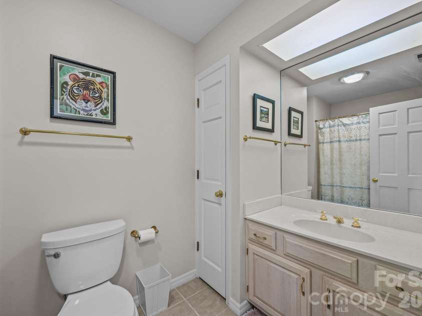 68 Stony Ridge, Asheville, NC 28804.  MLS# CAR4367321, YatesRealty ID 23646. The downstairs bath.