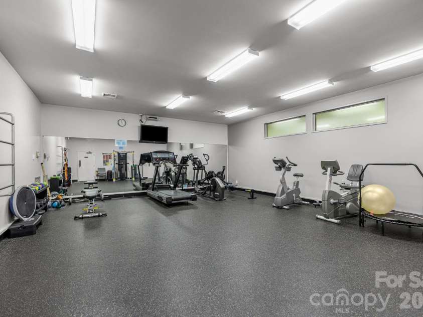 68 Stony Ridge, Asheville, NC 28804.  MLS# CAR4367321, YatesRealty ID 23646. There's also a gym...