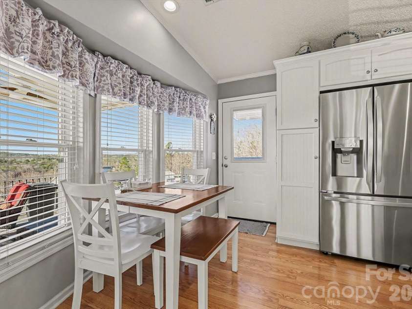 103 Oriole Road, New London, NC 28127.  MLS# CAR4335932, YatesRealty ID 2365. Dining offers a water view