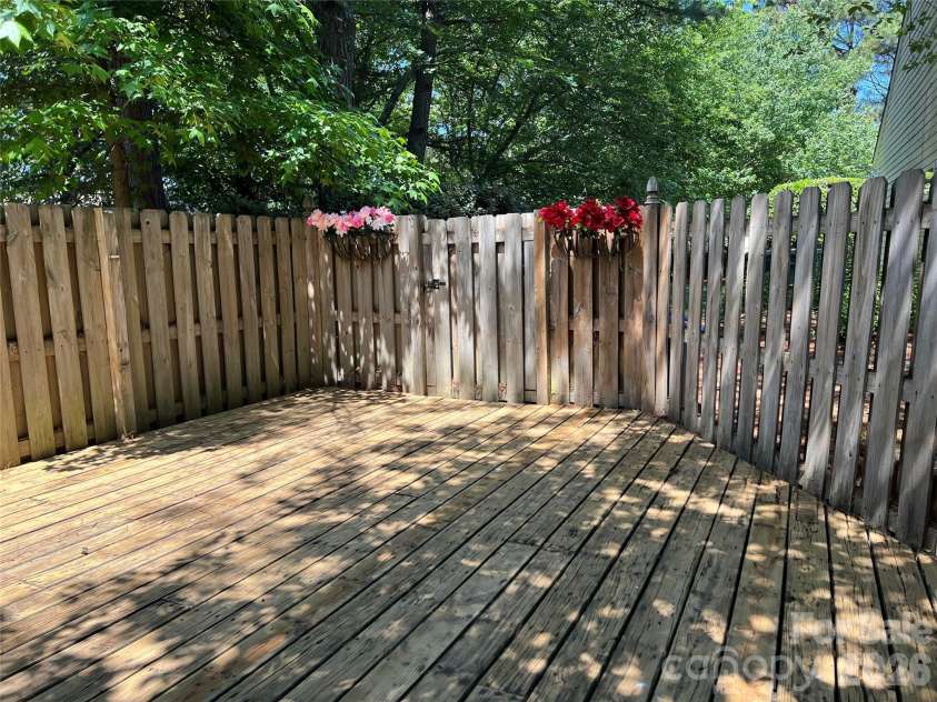 15415 Asterwind Court, Charlotte, NC 28277.  MLS# CAR4382864, YatesRealty ID 23651. View from backyard in May