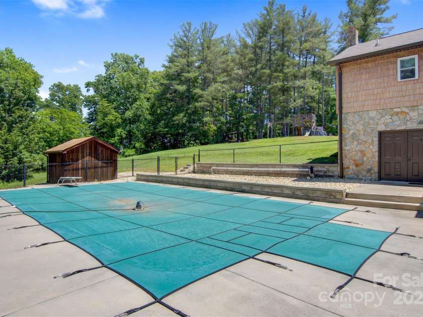 4962 Serenity Lane, Granite Falls, NC 28630.  MLS# CAR4263669, YatesRealty ID 23651. Salt water pool