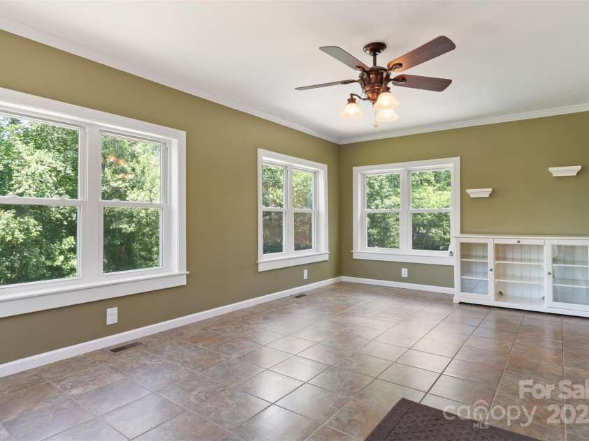 4962 Serenity Lane, Granite Falls, NC 28630.  MLS# CAR4263669, YatesRealty ID 23651. Sunroom / dining.