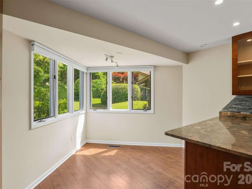 201 Timber Drive, Asheville, NC 28804.  MLS# CAR4373711, YatesRealty ID 23652. Kitchen dining area