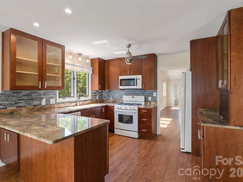 201 Timber Drive, Asheville, NC 28804.  MLS# CAR4373711, YatesRealty ID 23652. Kitchen w/ Granite Countertops
