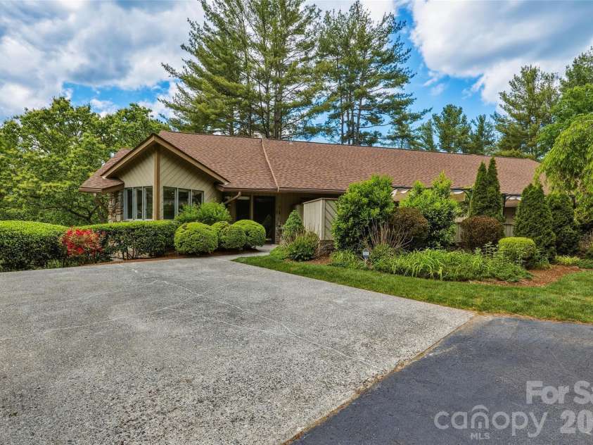 201 Timber Drive, Asheville, NC 28804.  MLS# CAR4373711, YatesRealty ID 23652. Two car driveway