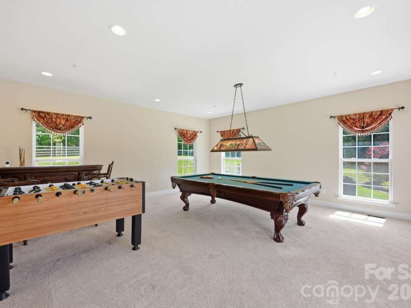 1434 Steeplechase Drive, Mount Pleasant, NC 28124.  MLS# CAR4378716, YatesRealty ID 23653. After a sensational dinner...have some competitive fun in your immense Recreational/Game room!