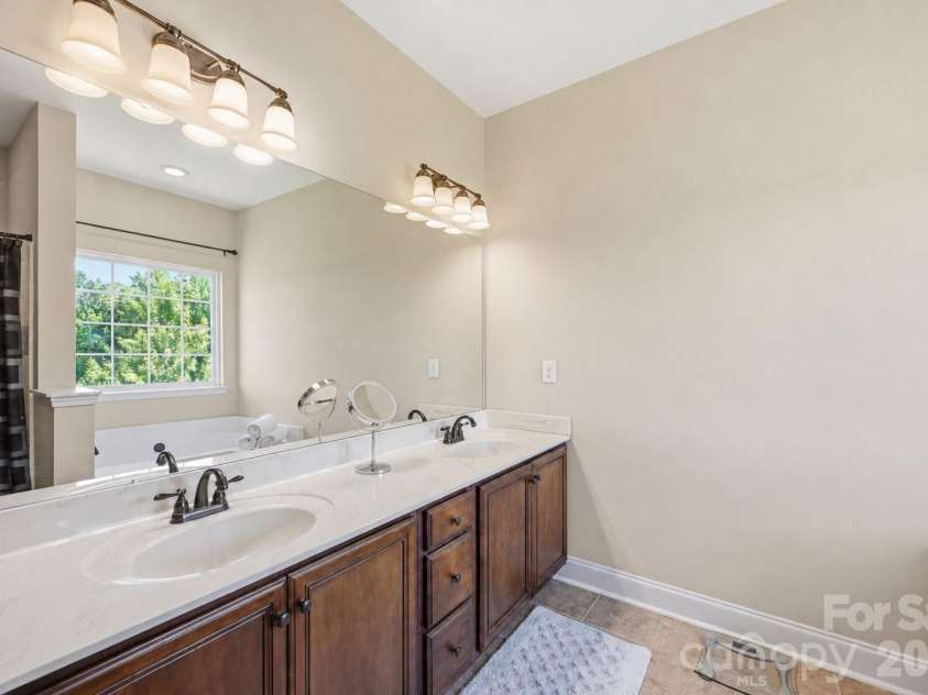 1434 Steeplechase Drive, Mount Pleasant, NC 28124.  MLS# CAR4378716, YatesRealty ID 23653. Another view of your dual-vanity.