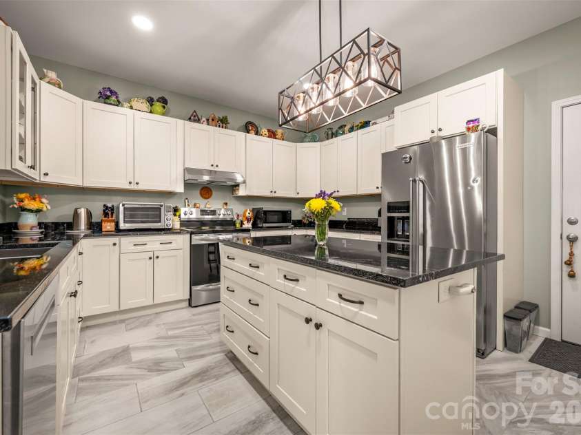 88 Pounding Mill None, Hendersonville, NC 28792.  MLS# CAR4367016, YatesRealty ID 23655. Abundant cabinetry and workspace 