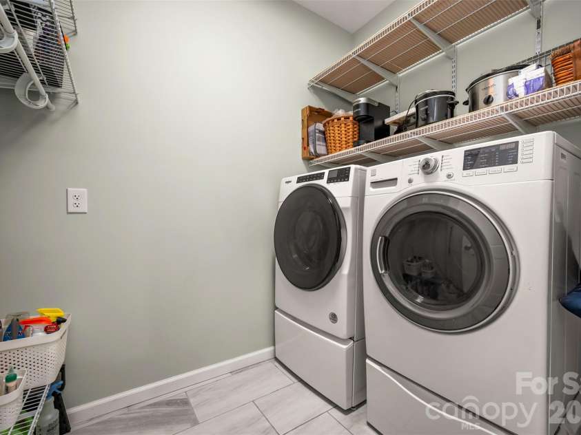 88 Pounding Mill None, Hendersonville, NC 28792.  MLS# CAR4367016, YatesRealty ID 23655. Laundry room just inside garage entry