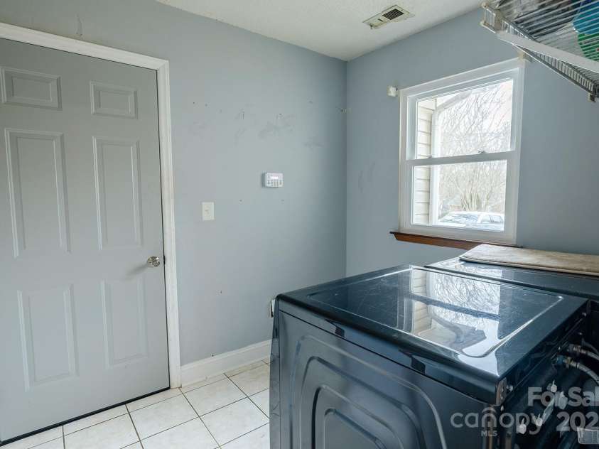 9232 Chislehurst Road, Mint Hill, NC 28227.  MLS# CAR4277120, YatesRealty ID 23656. Laundry