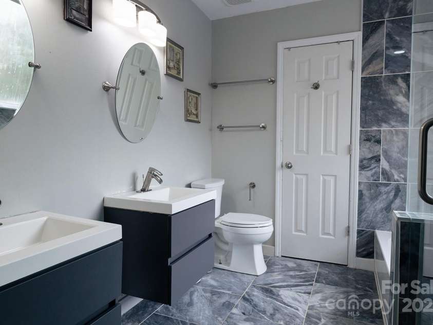 9232 Chislehurst Road, Mint Hill, NC 28227.  MLS# CAR4277120, YatesRealty ID 23656. Master bedroom bathroom 