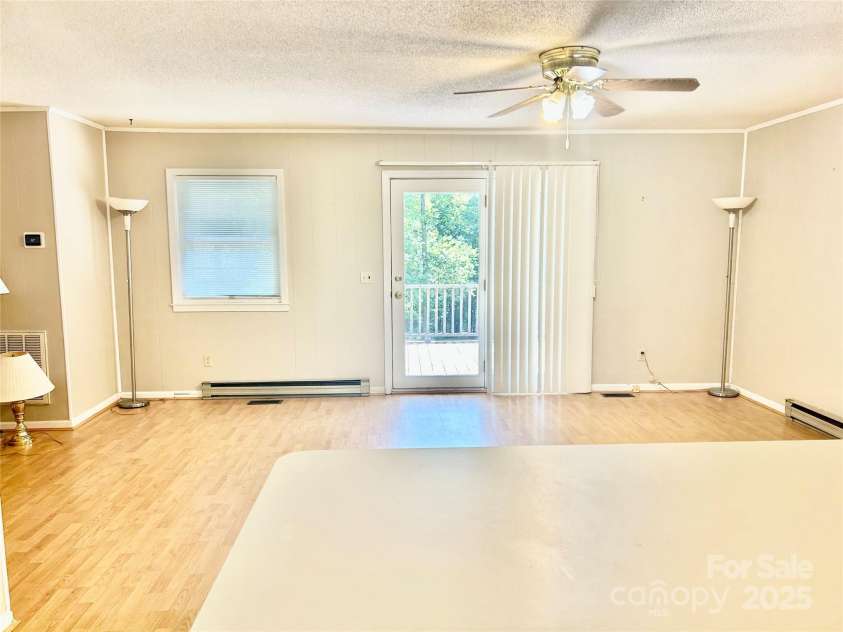 1010 MacArthur Road, Albemarle, NC 28001.  MLS# CAR4273748, YatesRealty ID 23658. Family Room