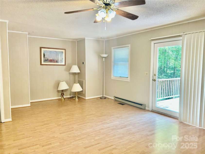 1010 MacArthur Road, Albemarle, NC 28001.  MLS# CAR4273748, YatesRealty ID 23658. Family room