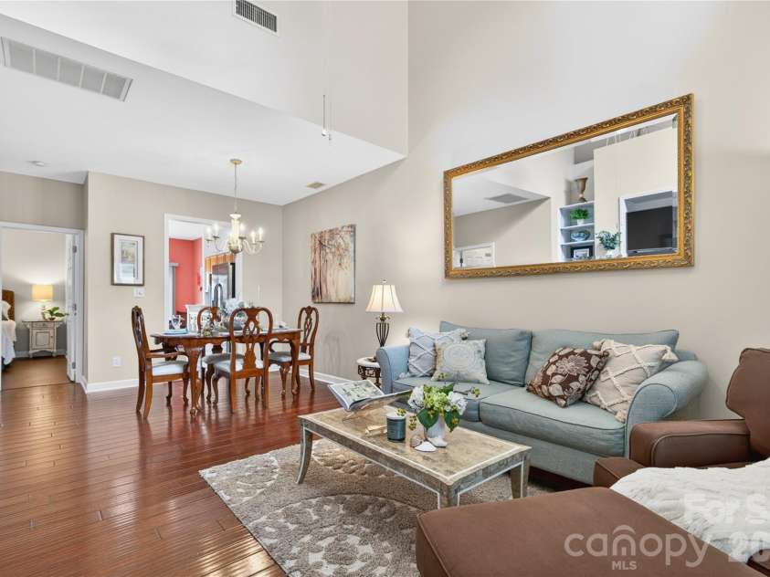 18310 Taffrail Way, Cornelius, NC 28031.  MLS# CAR4372401, YatesRealty ID 23659. Living and dining rooms