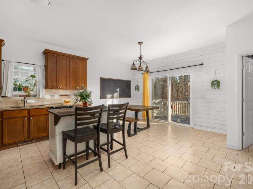 107 Barndale Drive, Troutman, NC 28166.  MLS# CAR4340490, YatesRealty ID 2366. Kitchen is large and perfect for entertaining